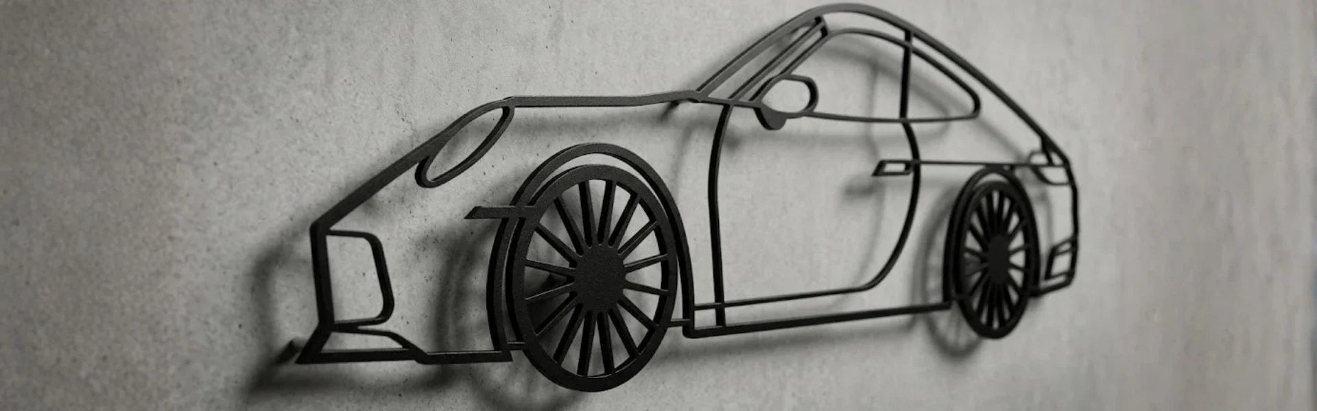 Baner kolekcji Ikony Motoryzacji ArtiLines – klasyczne i nowoczesne sylwetki kultowych aut jako ścienna sztuka motoryzacyjna.